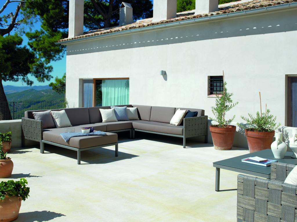 Vertchez aluminum right-arm sofa with brown cushions